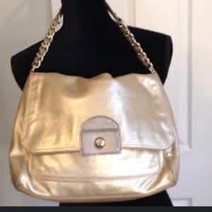 Cole Haan. Gold.  Worn once shoulder bag. This is the ultimate bag and luxurious